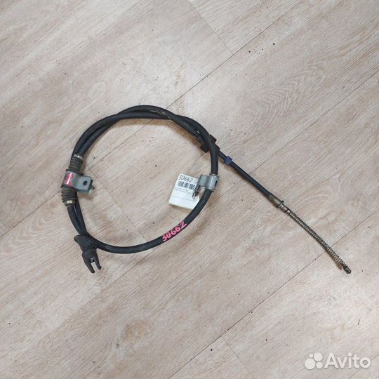 Трос ручника задний правый Mitsubishi Outlander Xl