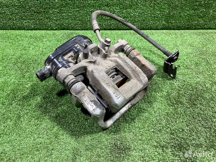 Суппорт задний левый Kia K5 с 2020