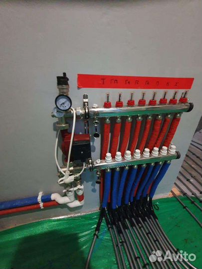 Монтаж системы отопления с тёплым полом в коттедже