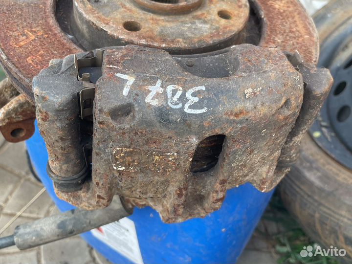 Суппорт тормозной Пежо 307