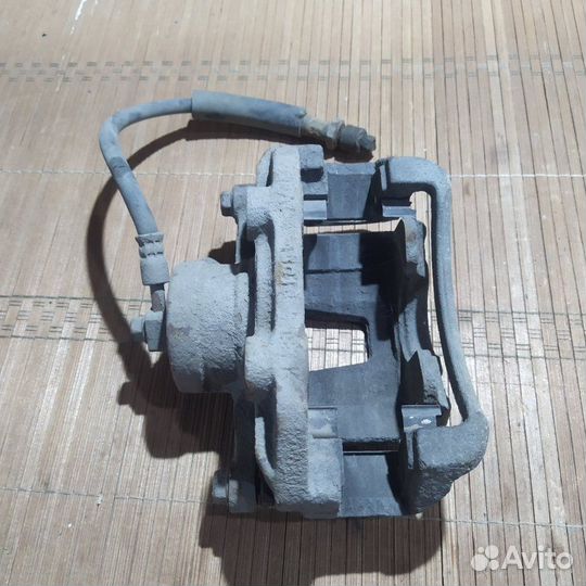 Суппорт тормозной передний правый Daewoo Nexia 1