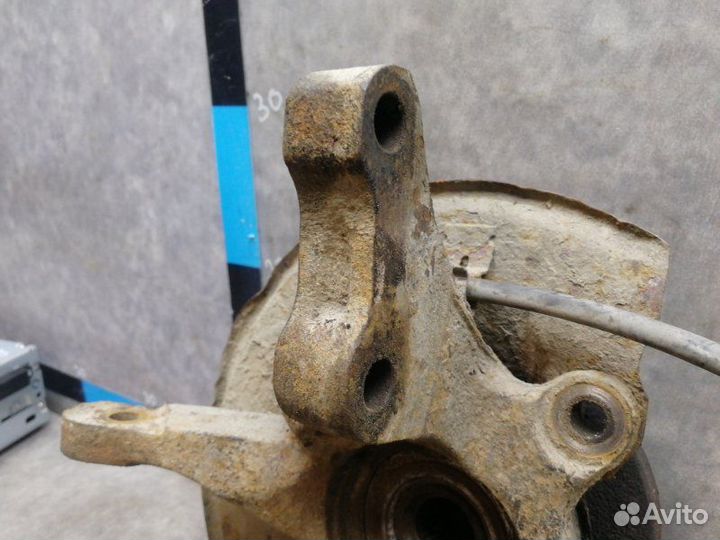 Кулак поворотный передний левый Mitsubishi Lancer