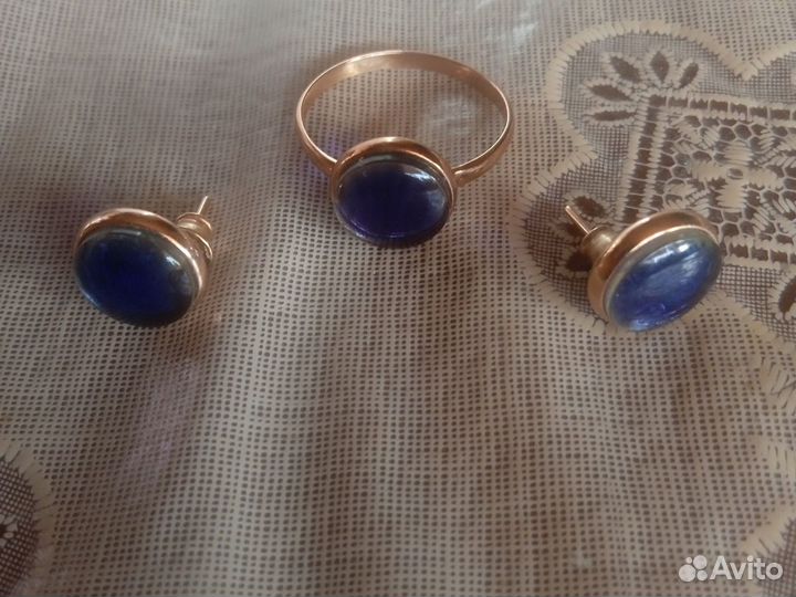 Серебрянные кольцо и серьги, янтарь синего цвета
