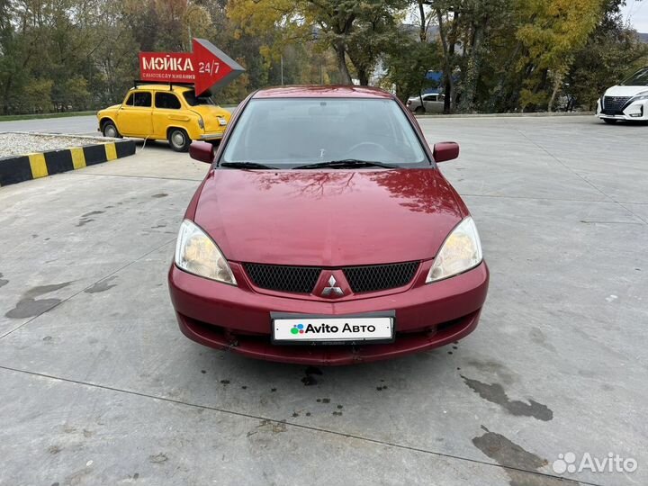 Mitsubishi Lancer 1.6 МТ, 2006, 238 500 км