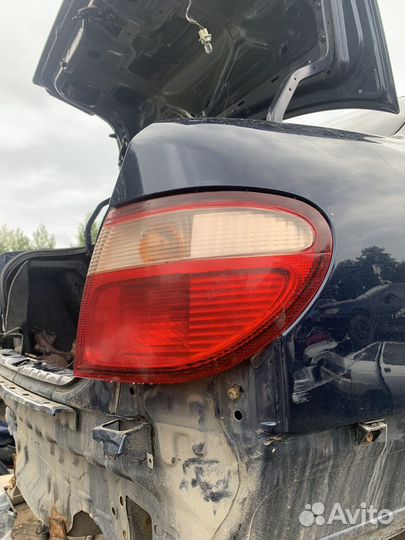 Фонарь наружный задний nissan almera n16