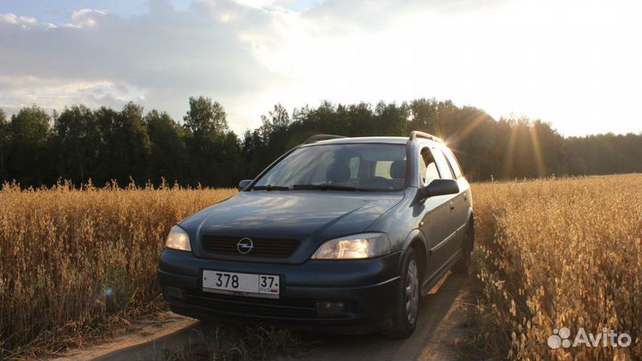 Заднее стекло на Opel Astra G универсал