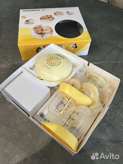 Двойной электрический молокоотсос medela