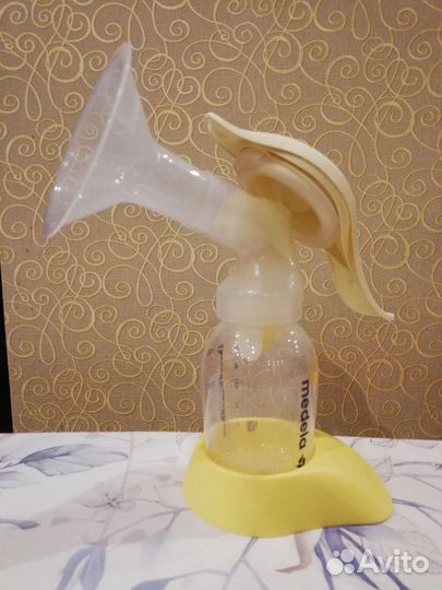 Молокоотсос ручной medela