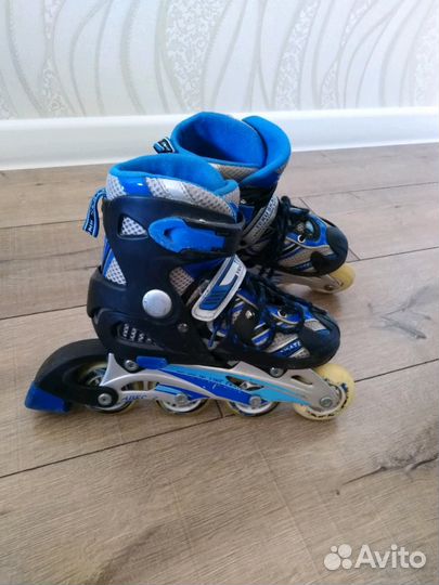 Коньки роликовые