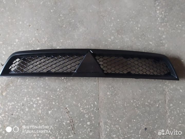 Решётка радиатора Митсубиси Лансер X