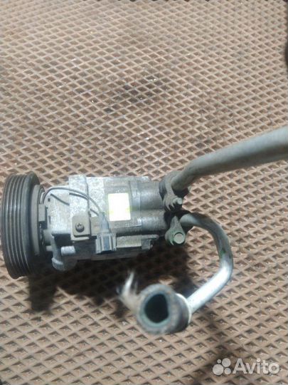 Компрессор кондиционера Nissan Wingroad WFY11