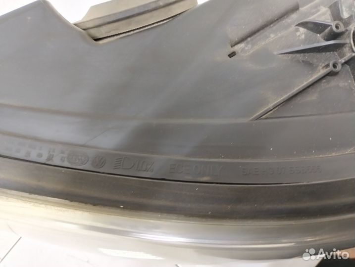 Фара левая Volkswagen Tiguan 1