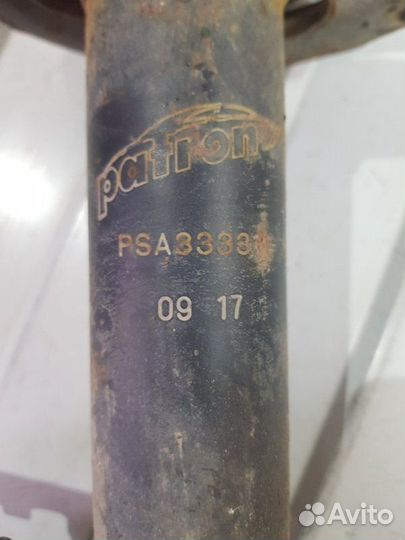 Амортизатор передний левый Nissan Almera Classic