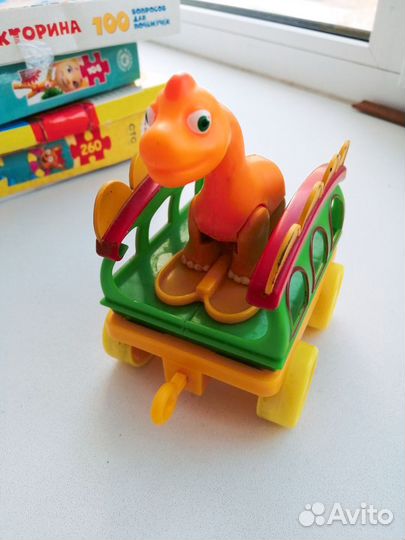 Игрушка динозавр