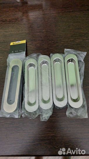 Дверные ручки и стопперы