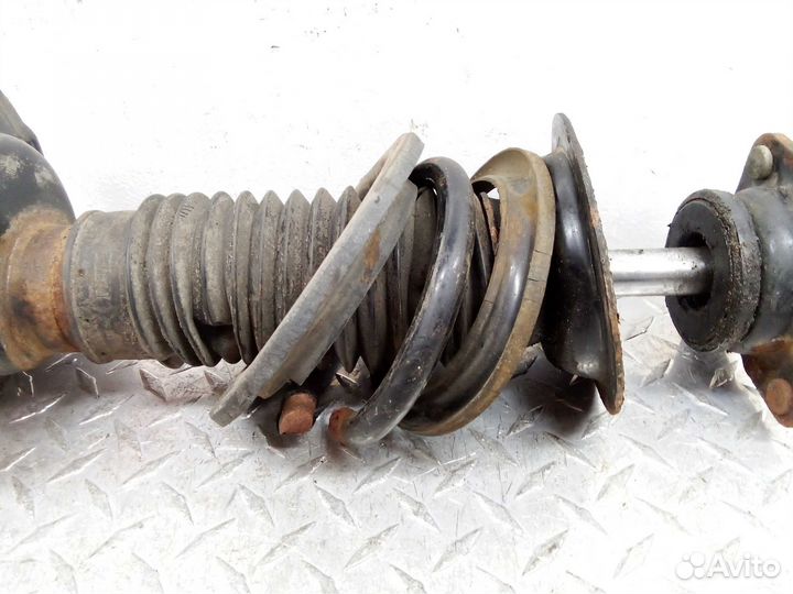 Амортизатор передний L Mazda CX-7 ER EG2334900