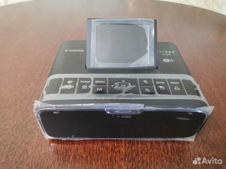 CanonSelphy CP1300+аккумулятор+комплект для печати