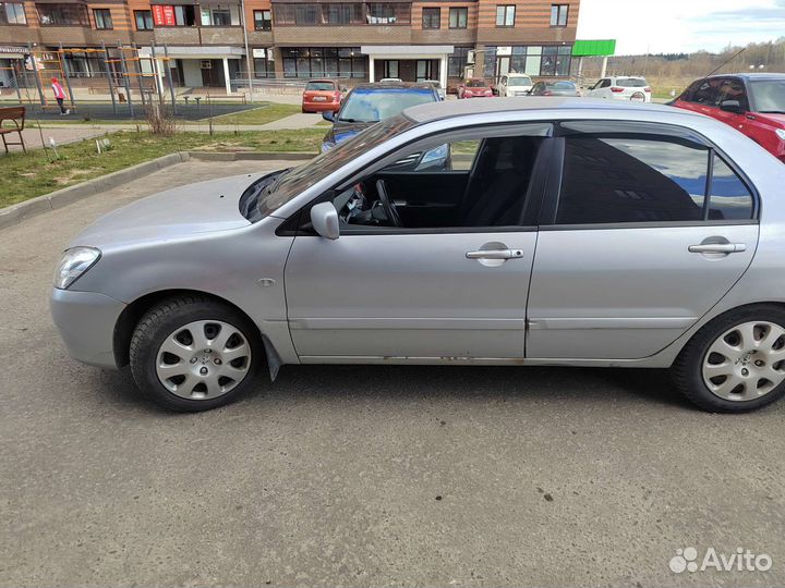 Mitsubishi Lancer 1.6 МТ, 2006, 300 000 км