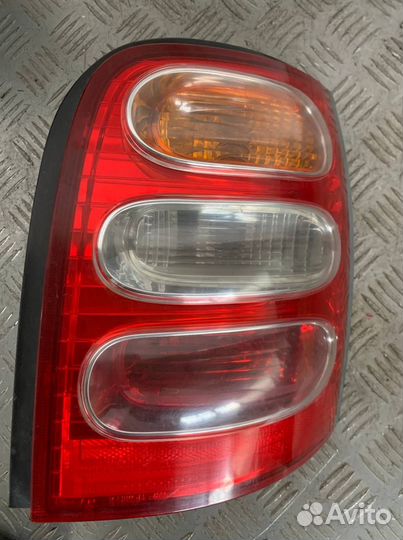 Фонарь задний правый Ниссан Марч К11