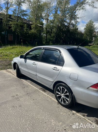 Mitsubishi Lancer 1.6 МТ, 2006, 195 000 км