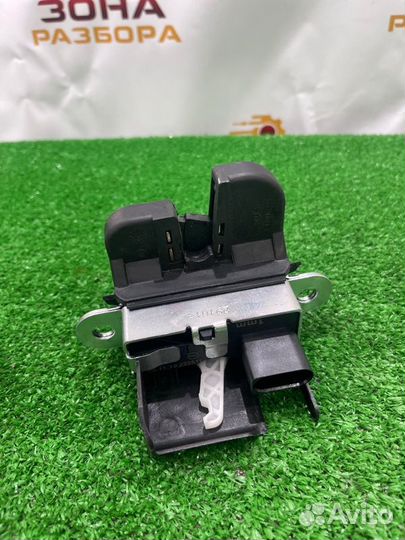 Замок багажника Volkswagen Golf MK7 CPT 2014