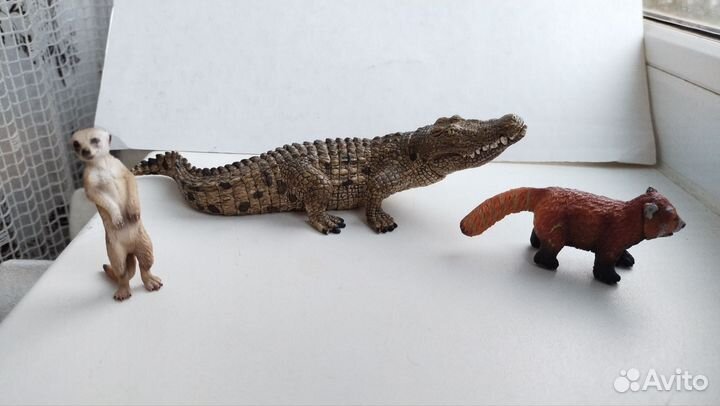 Дракон, динозавр, крокодил и сурикат schleich