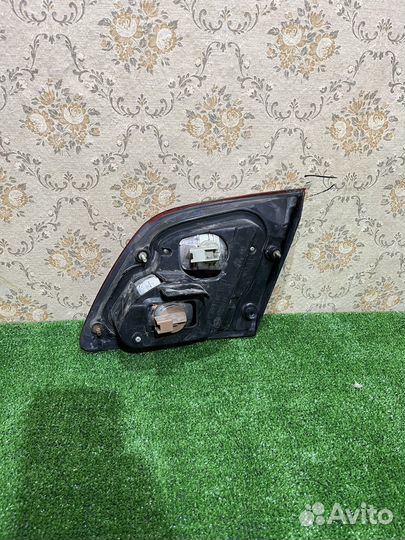 Фонарь левый в крышку багажника Nissan Maxima A33