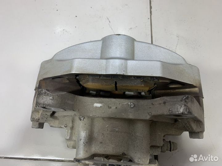 Суппорт задний левый