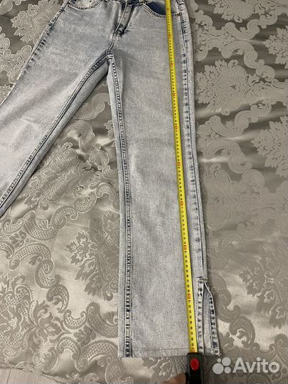 Джинсы с разрезами xs