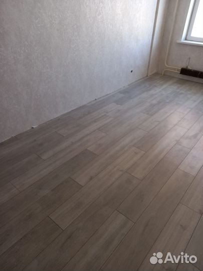 Укладка ламината и кварцвинила