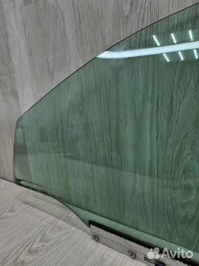 Стекло двери переднее левое Opel Astra H 2004-2014