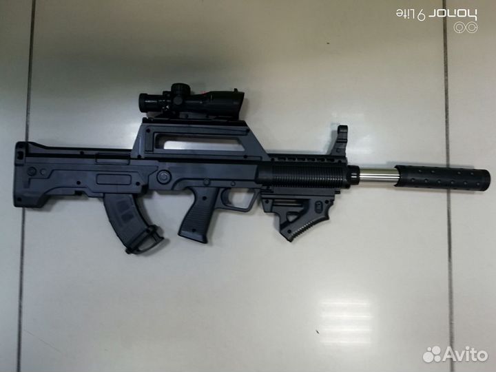 Игрушечный пластиковый автомат на пульках