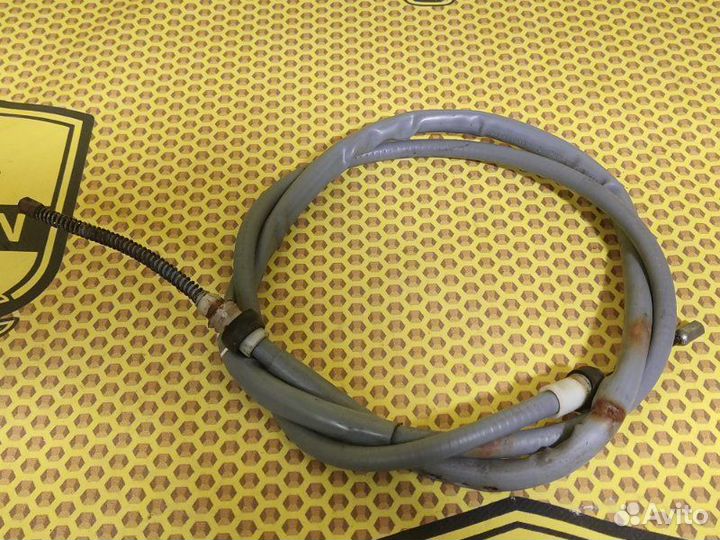 Трос стояночного тормоза левый Renault Logan L8