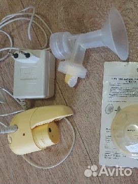 Молокоотсос medela электрический