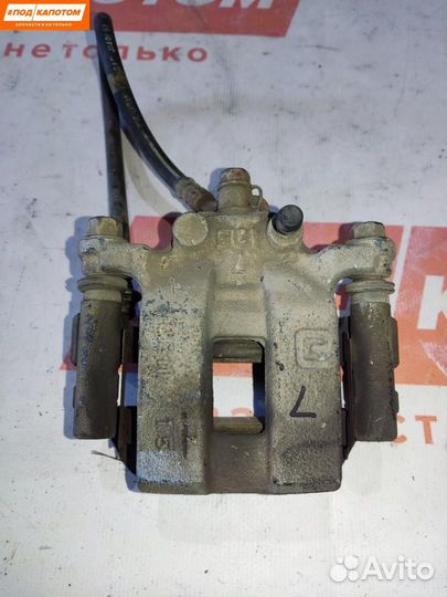 Суппорт тормозной задний левый Suzuki Grand Vitara