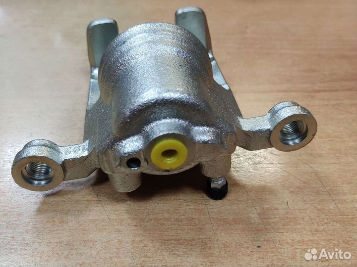 Суппорт тормозной задний Ниссан X-trail