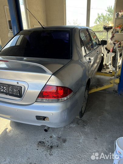 Разборка Митсубиси лансер 9