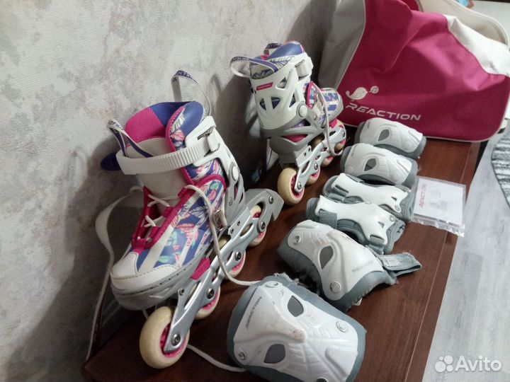 Роликовые коньки