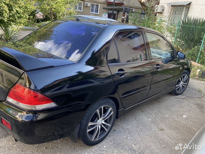 Mitsubishi Lancer 1.6 МТ, 2005, 308 000 км