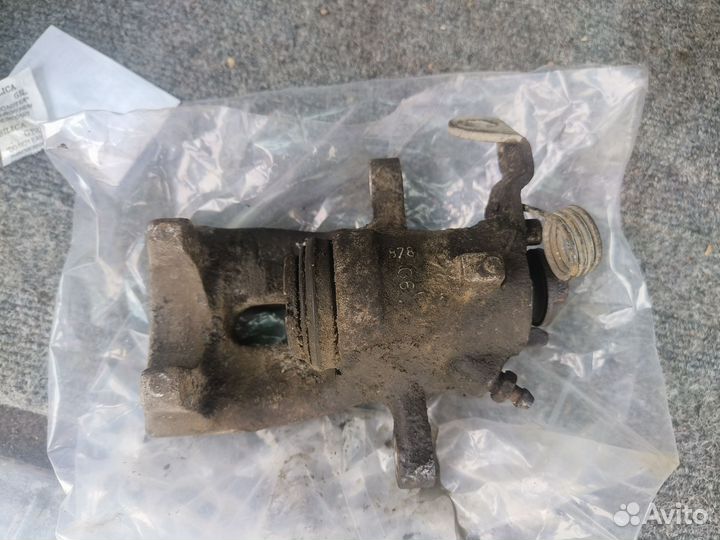 Тормозной суппорт astra h задний левый оригинал