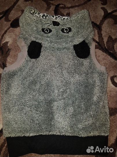 Меховая жилетка