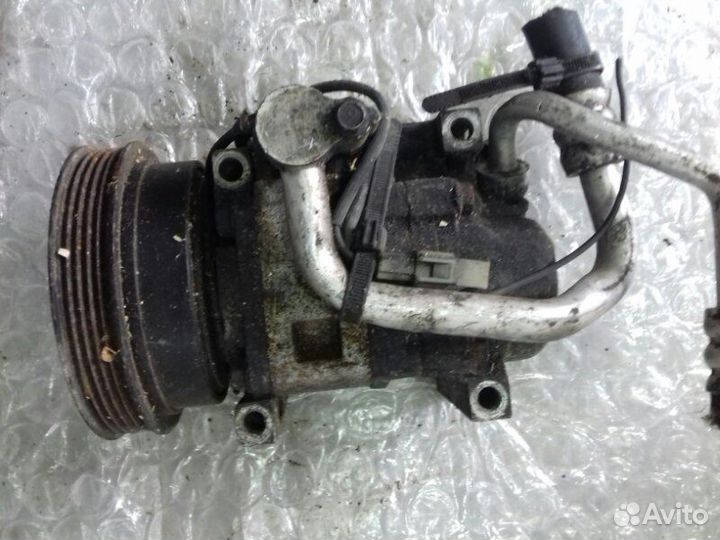 Компрессор кондиционера Mazda 323