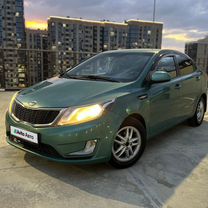 Kia Rio 1.4 AT, 2012, 172 500 км, с пробегом, цена 890 000 руб.