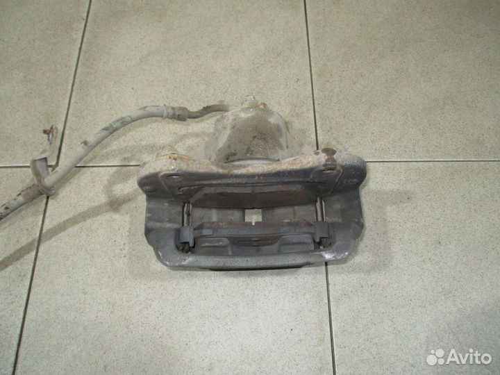 Суппорт передний левый Kia Sportage 3 (SL)