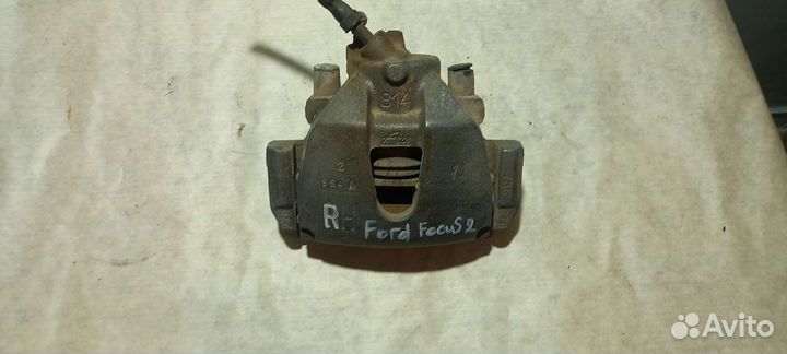 Суппорт передний правый Ford Focus2