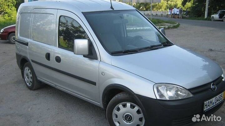 Заднее стекло на Opel Combo C Замена