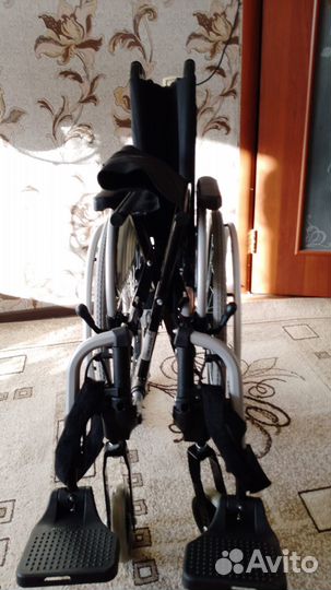 Инвалидное кресло