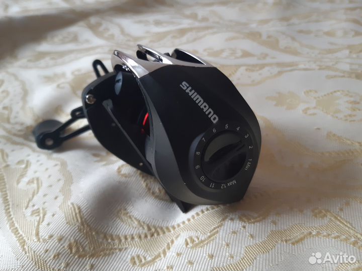 Мультипликаторная катушка shimano DW128R