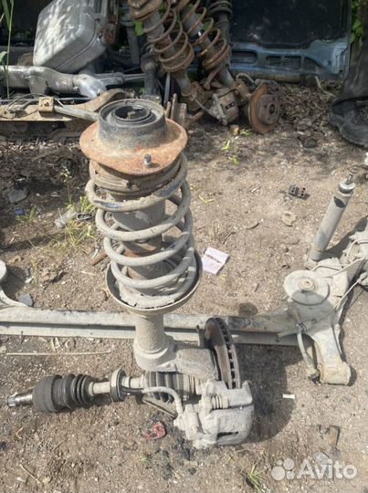 Передняя левая стойка Daewoo Nexia 1, 2