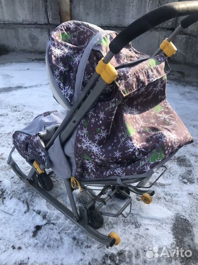 Зимняя детская коляска на полозьях с колесами